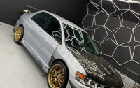 Brightsilver Mitsubishi Lancer 2003 for sale in Quezon