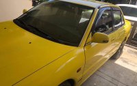 Yellow Mitsubishi Lancer 1994 for sale in Pateros
