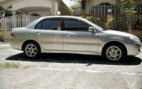 Selling Pearl White Mitsubishi Lancer 2004 in Imus