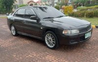 Selling Black Mitsubishi Lancer 1999 in Pasig