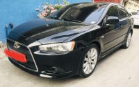 Selling Black Mitsubishi Lancer 2010 in Manila
